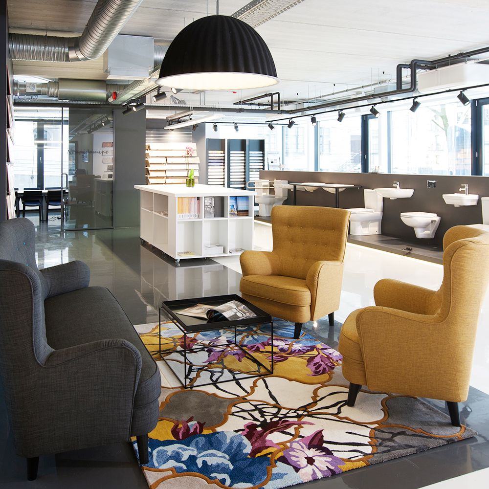 A floral hand tufted carpet at an interior design salon