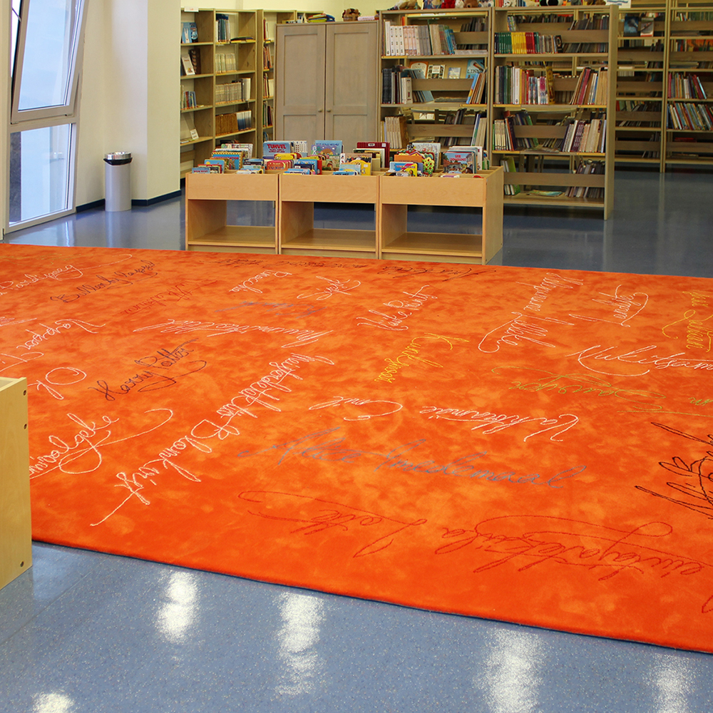Hand tufted wool carpet for a reading corner at a library